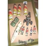 Unusual painted china models of Scots Guardsmen (4), a Britains field gun etc