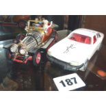 Corgi Toys 'Chitty Chitty Bang Bang" with three figures and a Corgi Jaguar XJ2 from "The Saint" (