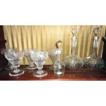 Set of five cut & engraved rummers, a pair of cut-glass decanters, and a small Irish glass port