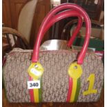 "Rasta" handbag with label stamped "Christian Dior"