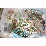 Large collection of colourful beaded necklaces