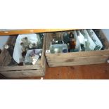 Two wooden crates of old chemist's and other glass bottles