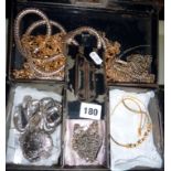 Assorted vintage white & gold metal jewellery in an old cash tin