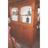 Victorian pine kitchen dresser having two glazed cupboard doors above single drawer and two dummy