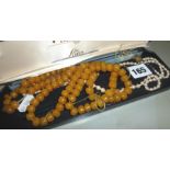 Amber bakelite beads & pearl necklace in case