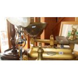Grocer's scales with three brass bell weights, a 'Student's' table lamp on gimbals in chrome, and
