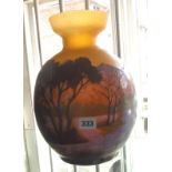 Large Galle type coloured cameo glass vase with acid etched overlay decoration of a landscape with