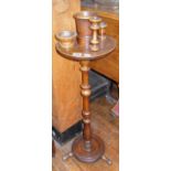 Victorian turned walnut smoker's stand with attached match holder, candlestick etc