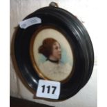 Portrait miniature of a woman, in ebonised oval frame