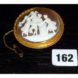 Large ornate cameo brooch with classical scene on 18ct mount