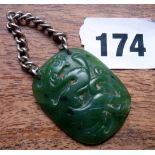 Jade pendant with carved Chinese dragon