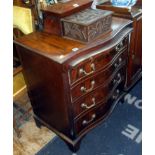 Reproduction mahogany serpentine-fronted chest of four drawers with brushing slide