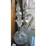 Pair of glass decanters with handles