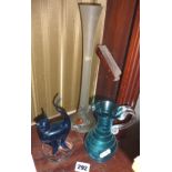 1970's blue glass cat figure, a Venetian blue glass jug with spiral overlay, and a smoked glass lily