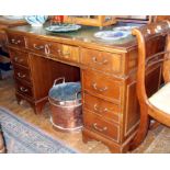 Reproduction mahogany nine-drawer kneehole desk