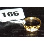 18ct gold ring inset with diamonds