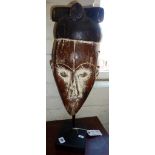 Tribal Art: Fang Mask, Gabon, 'NGIL' wood and kaolin, on stand, (from the Walter Steinberg