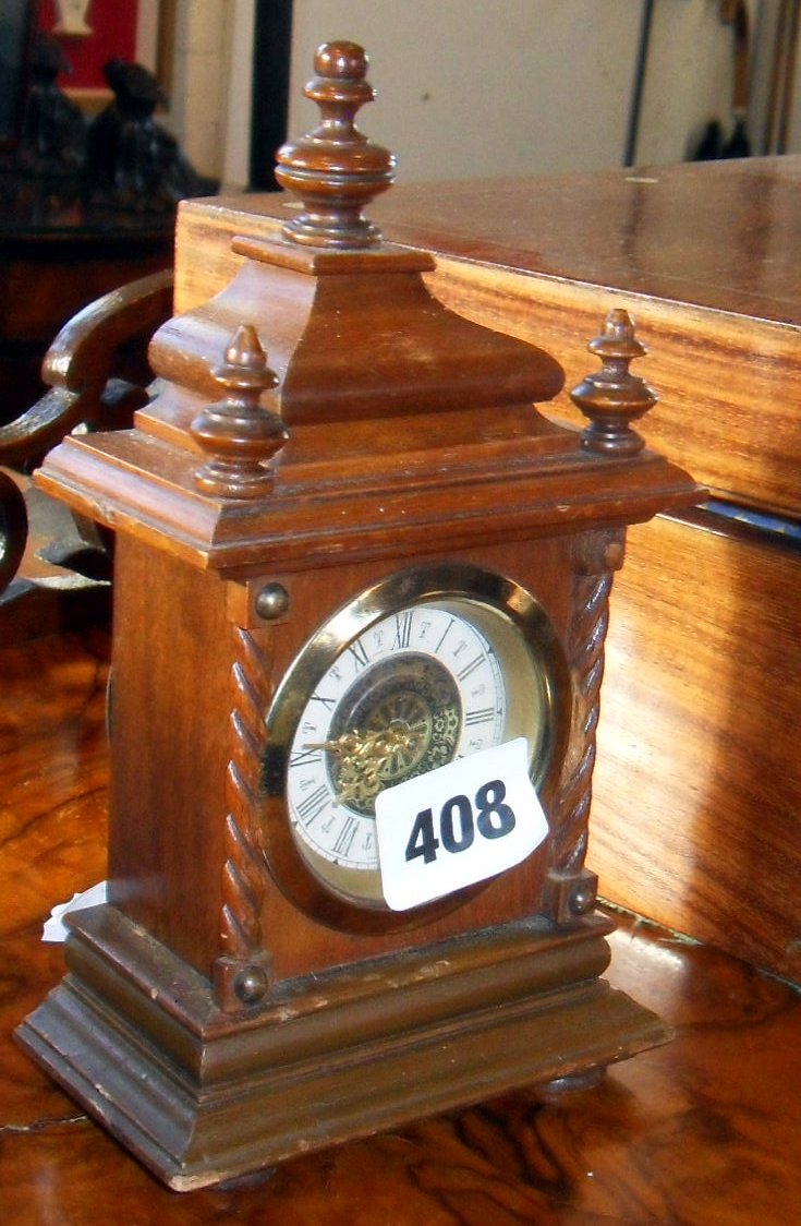 Miniature mahogany mantle clock