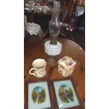 Victorian oil lamp with chimney, a Wadeheath biscuit barrel, and two paintings on glass by "J.