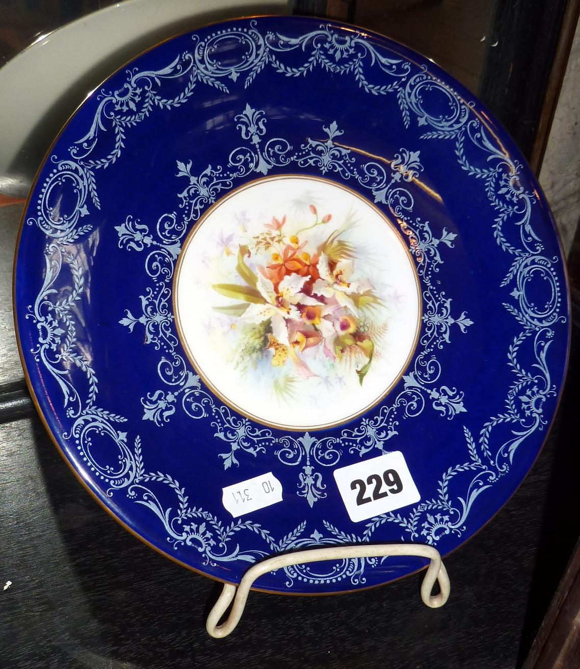 Royal Worcester 51 cabinet plate with dark blue border around floral centre