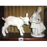 Russian porcelain lamb figurine, and a Russian porcelain figure group of a woman teaching a pupil to