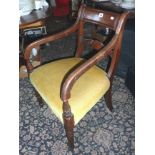 Early 19th c. mahogany elbow chair, and a pair of matching standard chairs