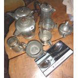 Craftsman pewter tea and coffee pots, with some Oneida Frostfire table spoons