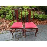 A pair of good quality mahogany dining c