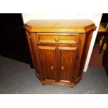 A canted cabinet with single drawer 75 c