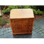 A walnut bureau, the slope front opening