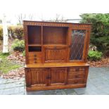 An oak wall cabinet by J C Furniture 162