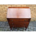 A mahogany bureau with three drawers 94