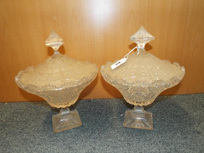 A pair of good quality lidded glass pede