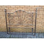 An ornamental metal bedstead 141cm (h) x