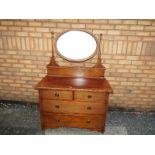 A good quality oak dressing-table with b