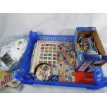 A large collection of UK and Worldwide postage stamps to include sheets and a large collection of