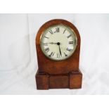 A walnut cased, dome topped mantel clock,