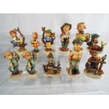 A collection of eleven Geobels figurines