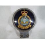 A vintage car badge, Parachute Training School,