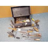 A tool box containing a good collection of wood working tools and similar