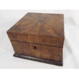 A lidded wooden trinket box with veneered decoration,