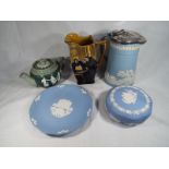 A good mixed lot of Jasperware to include a blue and white jug decorated with a hunting scene with