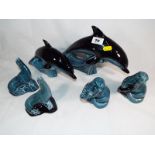 Poole Pottery - A collection of 6 Poole Pottery figurines to include dolphins,