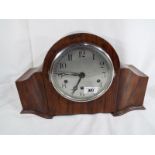 A mahogany cased Westminster quarter chiming mantel clock, silvered dial behind chrome bezel,