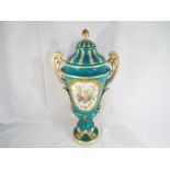 A very large twin-handled lidded urn shaped vase in the style of Minton, 49 cm,