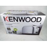 Unused surplus stock (not returns) - a Kenwood brushed and polished metal toaster TTM 100 900 watt