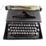 A good quality vintage Royal De Luxe typewriter set in hard carry case