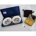 A musical powder compact marked Mascot ASB in soft pouch, and a pair of Royal Worcester pin dishes,