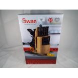 Unused surplus retail stock (not returns) - a Swan 31 piece knife block with kitchen tool set,
