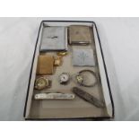 A good mixed lot to include a Rocar 7 jewel white metal wristwatch with expandable bracelet,